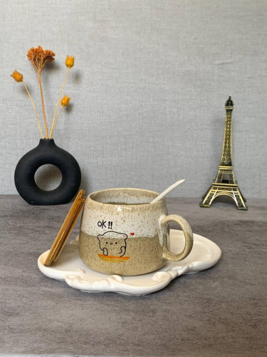 Fancy ceramic mug with wooden lid and spoon - an attractive gift