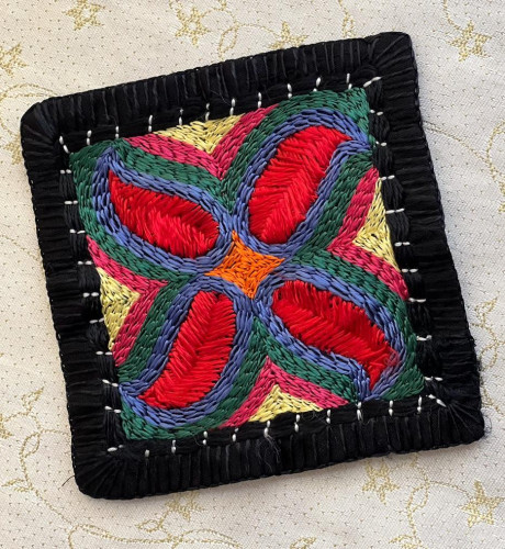 Hand-embroidered tablecloth