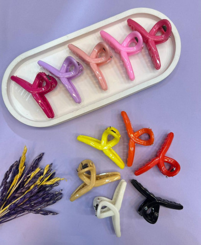 Fancy hair clips with knot design in various colors